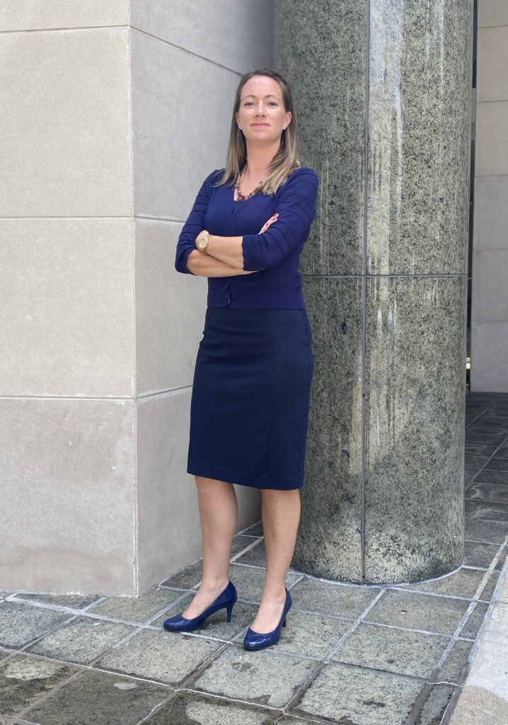 color photo-criminal defense lawyer for Vero Beach, FL Dorothy Naumann outside courthouse